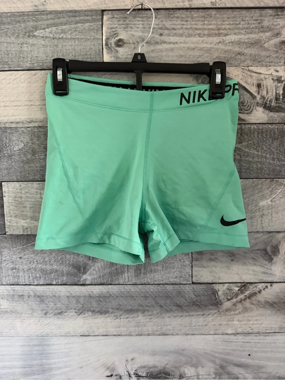 Nike Mint Green Athletic Compression Shorts with Black Swoosh